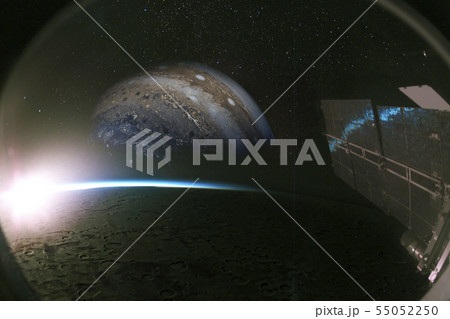 Jupiter and its moon from the spaseship window 55052250