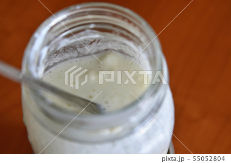 Close-up shot of a glass jar filled with 55052804
