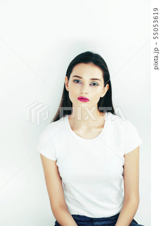 young pretty teenage girl posing emotional happy smiling on white background, lifestyle people young pretty teenage girl posing emotional happy smiling on white background, lifestyle people 55053619