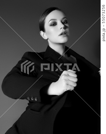 Beauty fashion girl with evening makeup . Black 55073256