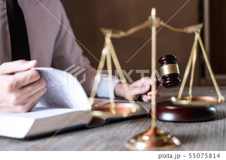 Judge gavel with scales of justice, male lawyers Judge gavel with scales of justice, male lawyers 55075814