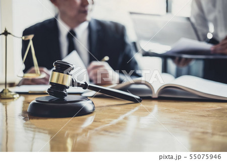 Male lawyer or Counselor working in courtroom have Male lawyer or Counselor working in courtroom have 55075946