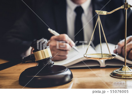 Professional Male lawyer or judge working with 55076005