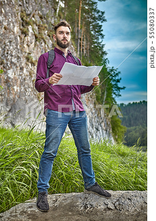 Young man travels in the wild. Young man travels in the wild. 55080337