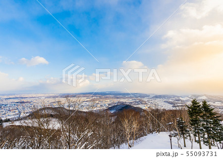Beautiful landscape with mountain around tree in snow winter season at sunset time Beautiful landscape with mountain around tree in snow winter season at sunset time 55093731