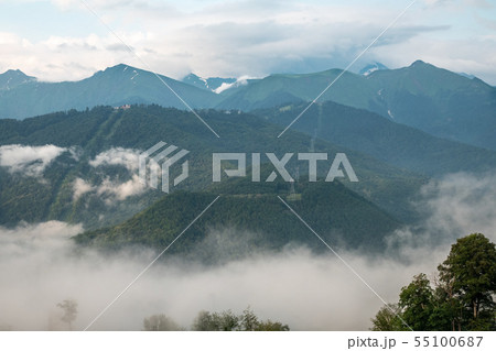 Clouds and fog on the slopes of mountain ranges Clouds and fog on the slopes of mountain ranges 55100687