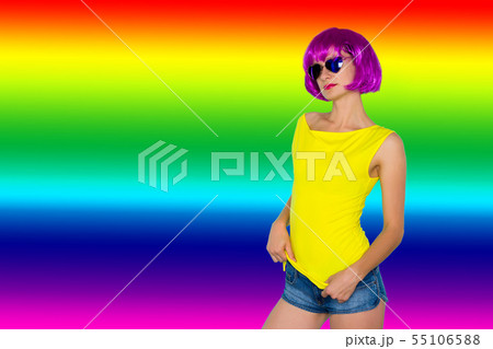 Portrait of young transgender woman in pink wig 55106588