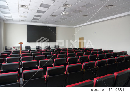 Rows of red seats 55108314