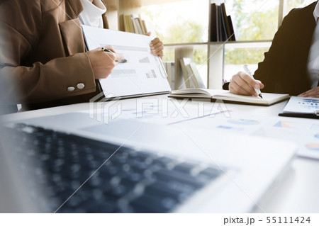 business financier audit working with laptop and business financier audit working with laptop and 55111424