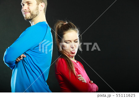 Offended couple back to back. Funny woman. Offended couple back to back. Funny woman. 55111625