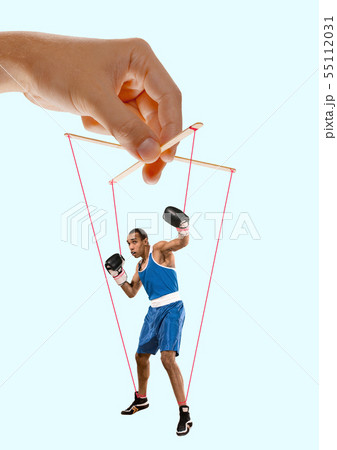 Man like a puppet in somebodies hands. Concept of manipulation 55112031