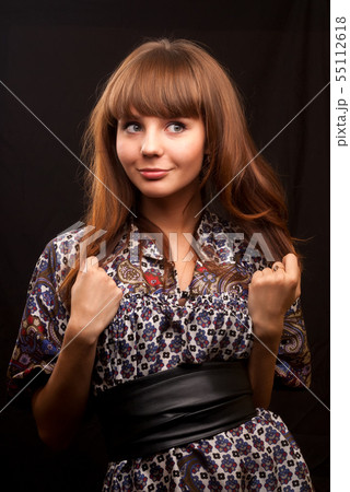 Beautiful young woman with red hair Beautiful young woman with red hair 55112618