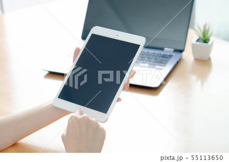 Business woman using laptop and smart phone stock 55113650