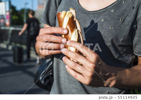 man eating a german ham sandwich man eating a german ham sandwich 55114935