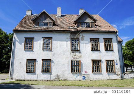 Old abandoned house. Dormer in the roof. Old abandoned house. Dormer in the roof. 55116104