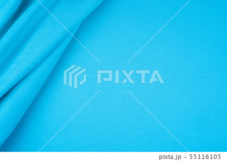 Bright blue fabric texture with folds. Bright blue fabric texture with folds. 55116105
