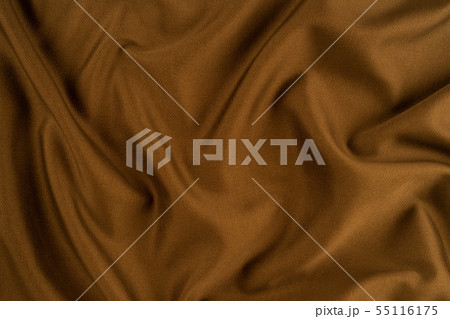 Texture of brown fabric close up.   55116175