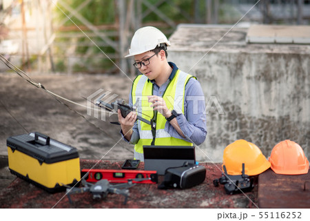 Asian engineer man using drone for site survey 55116252