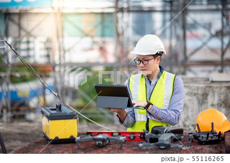 Asian engineer man using drone for site survey 55116265