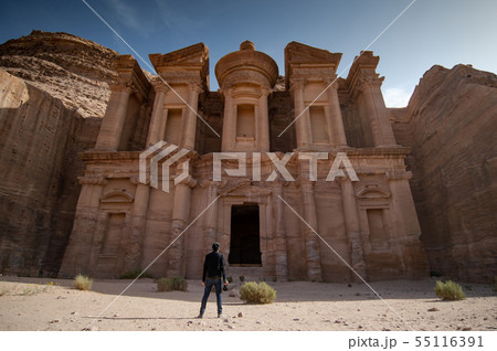Asian photographer standing in Petra, Jordan Asian photographer standing in Petra, Jordan 55116391