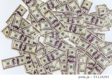 a lot of dollars banknotes on a white background, a lot of dollars banknotes on a white background, 55119265