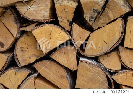 chopped birch logs background Rustic base end of chopped birch logs background Rustic base end of 55124072