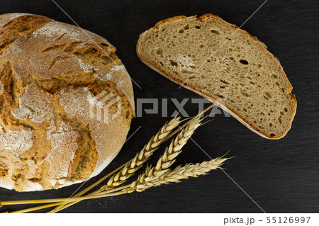 Rye wheat bread on grey stone 55126997