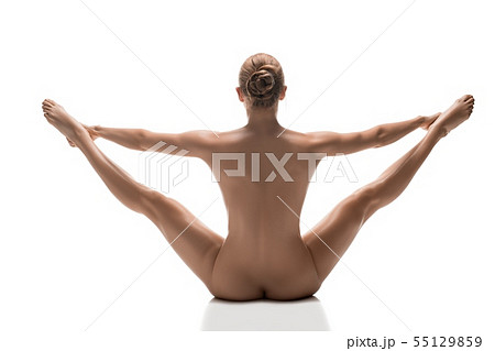 Woman in the nude sitting in a split isolated shot Woman in the nude sitting in a split isolated shot 55129859