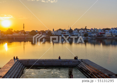 Ghats at Pushkar lake at sunset in Rajasthan. 55131295