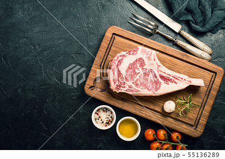 Raw tomahawk beef steak 55136289