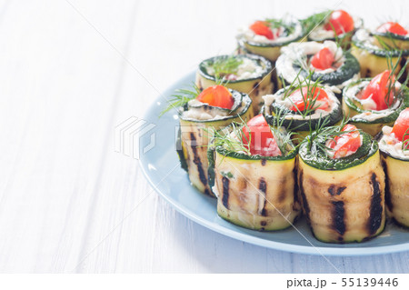 Zucchini rolls with cream cheese , tomatoes and Zucchini rolls with cream cheese , tomatoes and 55139446