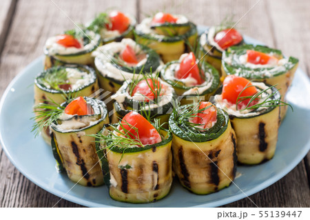 Zucchini rolls with cream cheese , tomatoes and Zucchini rolls with cream cheese , tomatoes and 55139447