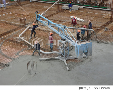 Concreting work by construction workers Concreting work by construction workers 55139980