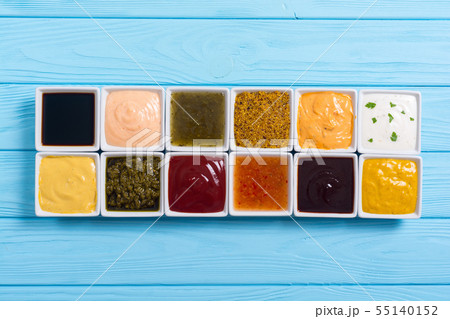 Set of different sauces in ceramic bowl Set of different sauces in ceramic bowl 55140152