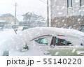 Car covered with snow during snowstorm 55140220