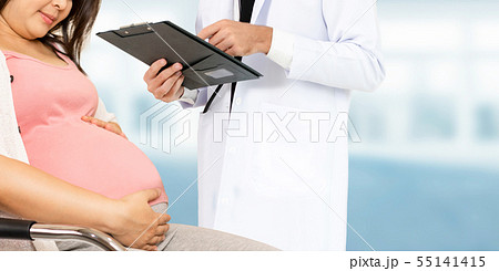 Pregnant Woman and Gynecologist Doctor at Hospital Pregnant Woman and Gynecologist Doctor at Hospital 55141415