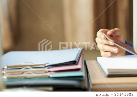 Woman opening planner 55141905
