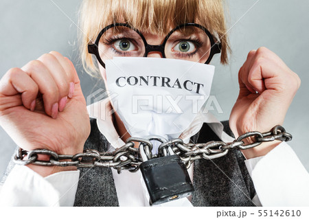 Furious woman with chained hands and contract 55142610