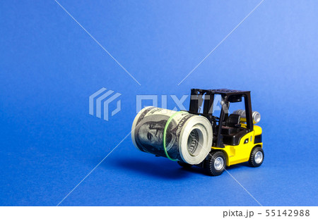 Forklift truck carries a bundle of dollars 55142988
