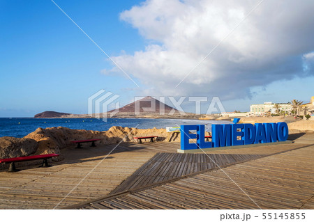 Sign El Medano on long promenade along the coast 55145855