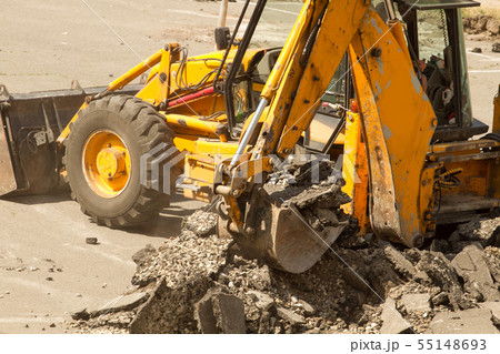 Tractor Dismantles Asphalt Tractor Dismantles Asphalt 55148693