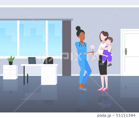 doctor pediatrician giving lollipop to little boy consultation healthcare concept mother holding doctor pediatrician giving lollipop to little boy consultation healthcare concept mother holding 55151394