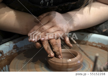hands while crafting pottery detail close up 55152208