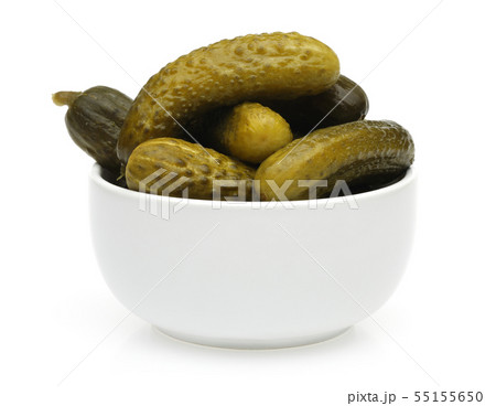 Pickled cucumbers in a bowl isolated Pickled cucumbers in a bowl isolated 55155650