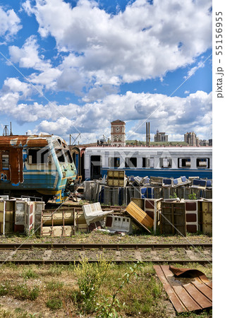 Railroad depot with abandoned trains and wagons Railroad depot with abandoned trains and wagons 55156955