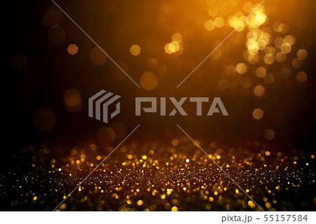 Golden abstract bokeh on black background. Golden abstract bokeh on black background. 55157584