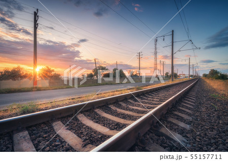 Railroad and beautiful sky at sunset in summer 55157711