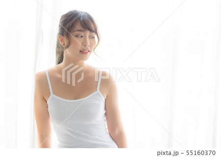 Portrait of beautiful young asian woman standing Portrait of beautiful young asian woman standing 55160370