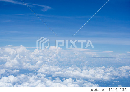 Top view on plane of Blue sky and white puffy 55164135