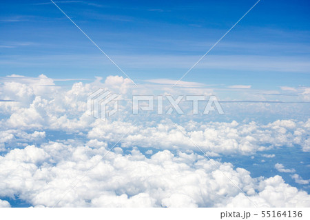 Top view on plane of Blue sky and white puffy 55164136
